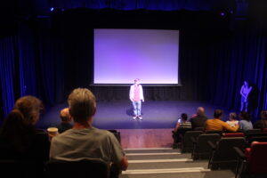 The students introducing the screening before it begins
