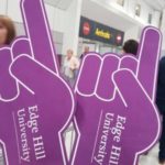 Edge Hill welcome sign at airport