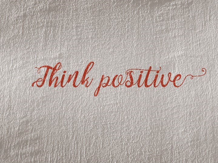An image that says think positive.