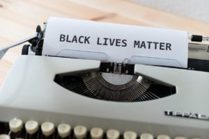 Typewriter with BLACK LIVES MATTER typed on the paper.