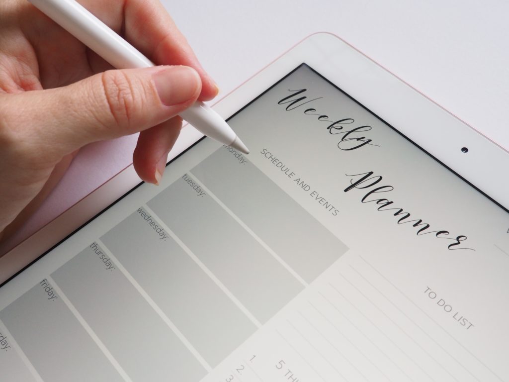 An ipad showing a weekly planner