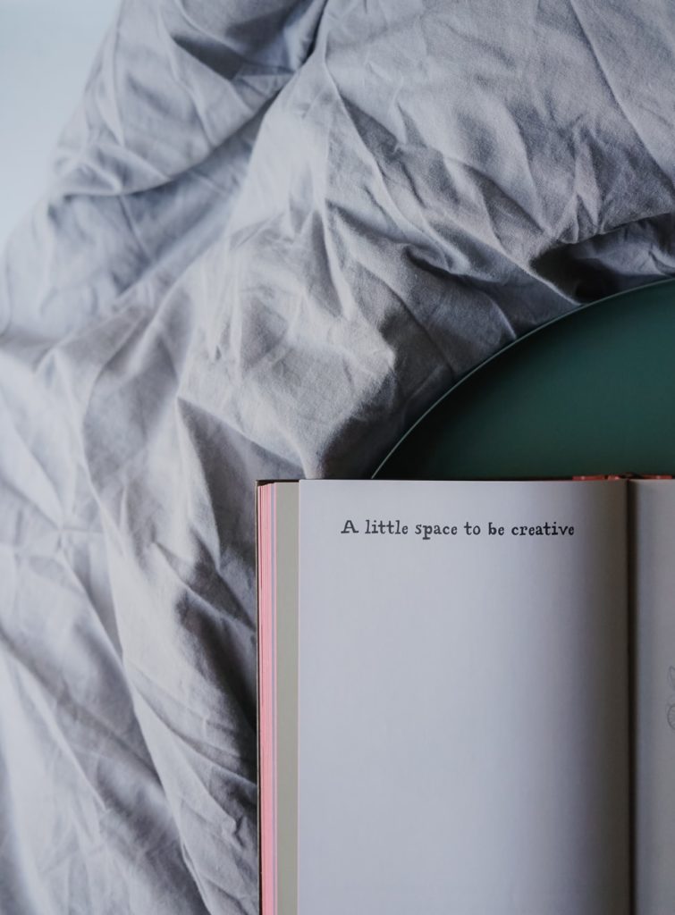 image of a notebook that says "a little  space to be creative"