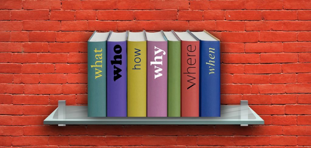 Books on a shelf with what, who, how, why, where, when on the spines